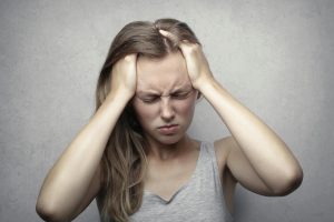 frustrated woman thinking about using spironolactone for hair loss